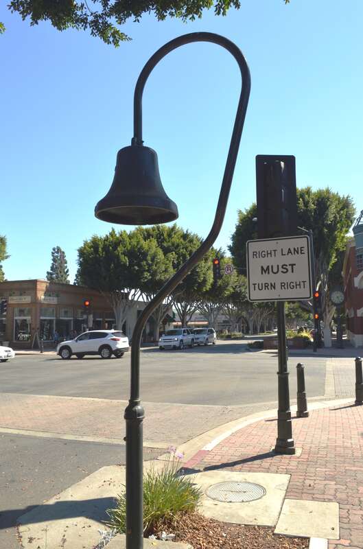 El Camino Real bell on the northwest corner of Main Street and El Camino Real in Tustin, California.