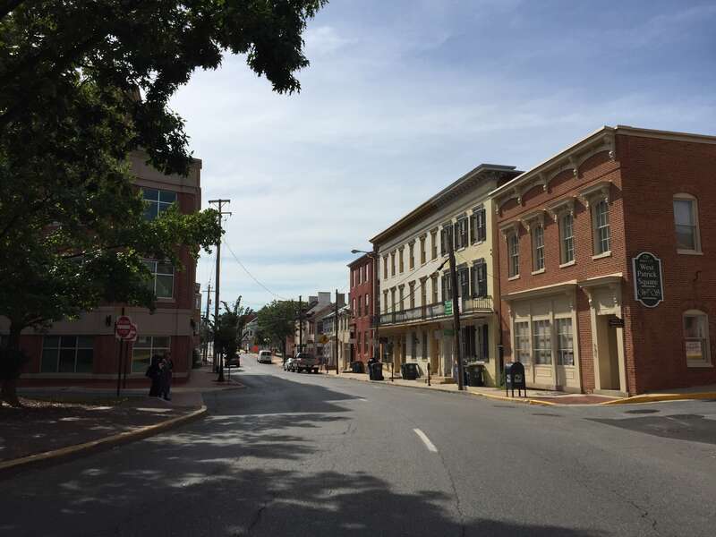 View west along Maryland State Route 144 (Patrick Street) between Court Street and Bentz Street in Frederick, Frederick County, Maryland