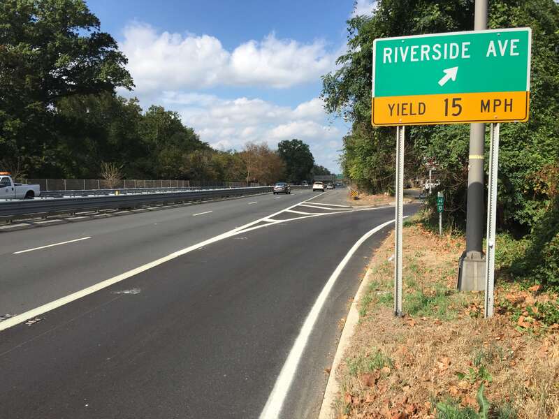 View north along New Jersey State Route 29 (John Fitch Parkway) at the exit for Riverside Avenue in Trenton City, Mercer County, New Jersey