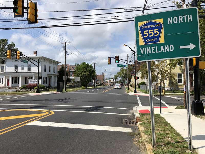 View west along New Jersey State Route 49 (Main Street) at Cumberland County Route 555 (Third Street) in Millville, Cumberland County, New Jersey