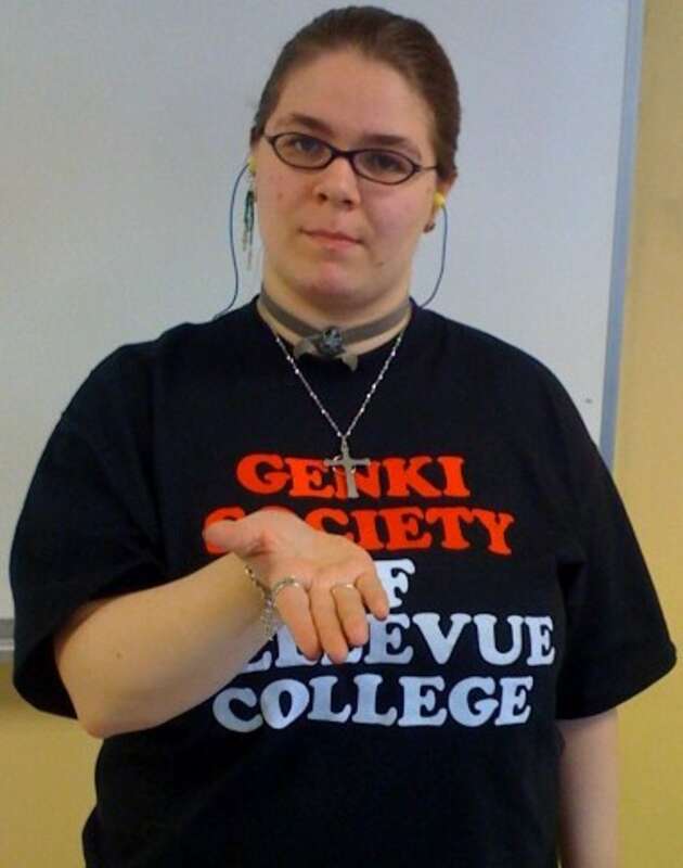 The final posture of the ASL sign THANK-YOU (wikt:en:OpenB@Chin-PalmBack OpenB@FromChin-PalmUp)