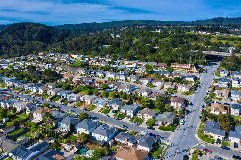 A view from above of Jenevein and Cedar Avenues with Interstate 280 in the background.