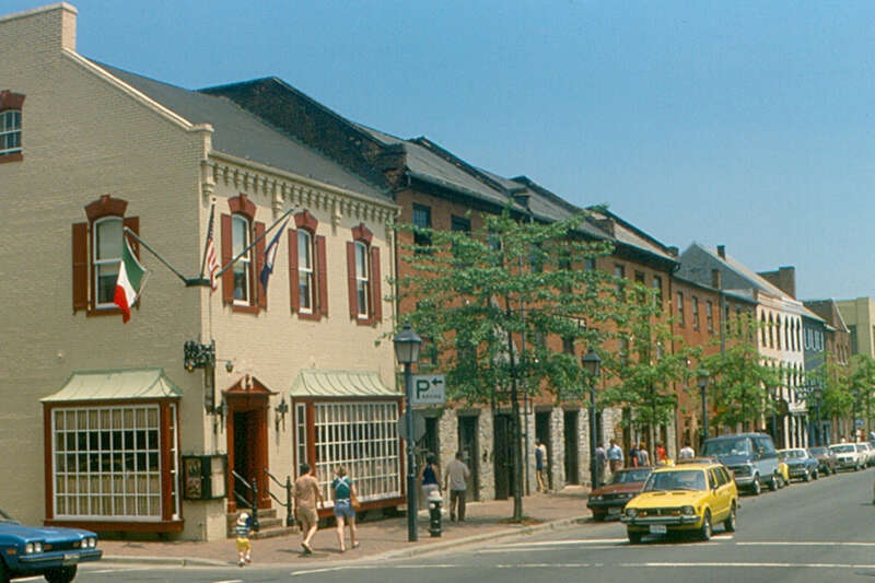 King Street is the main street of Old Town Alexandria.  I do not know whether these buildings are original, or were built in the style of the late 1700s.  
Alexandria was laid out as a city around 1750, well before Washington, D.C. was founded.  It