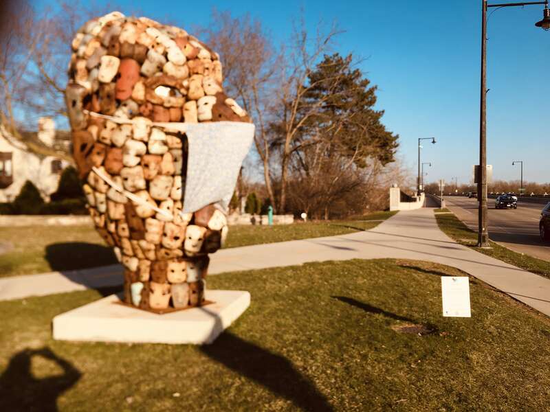 Appleton's 'big head' sculpture fitted with face mask during coronavirus pandemic