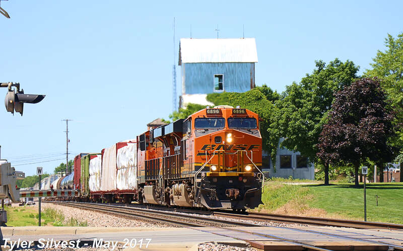 Burlington Northern Santa Fe 6896(ES44C4) and 8079(ES44C4) Lead a Northbound Manifest on the BNSF Fort Scott Sub at the Noland Road Crossing south of Santa Fe Trail Drive in Lenexa, Kansas.
Video Link: 
Photo Taken: 5-28-17 at 12:10 pm

Picture ID#