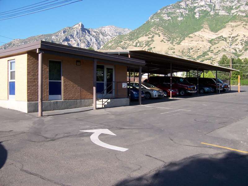 Photograph of the Physical Plant Motor Pool Office Building at Brigham Young University.