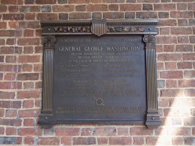 A memorial plaque near the main entrance into Christ Church in Alexandria, Virginia.