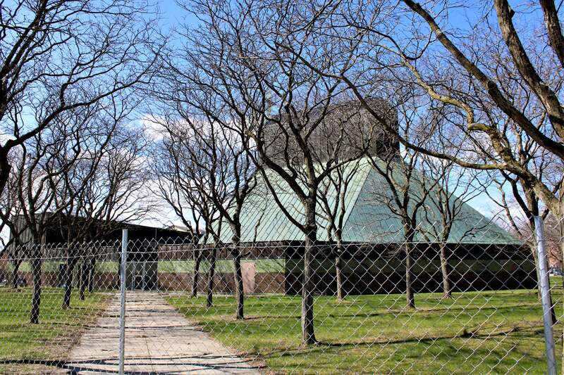 The former Cathedral of the Immaculate Conception in Burlington, Vermont. The property, which has been listed for sale, is now surrounded by a chain link fence.