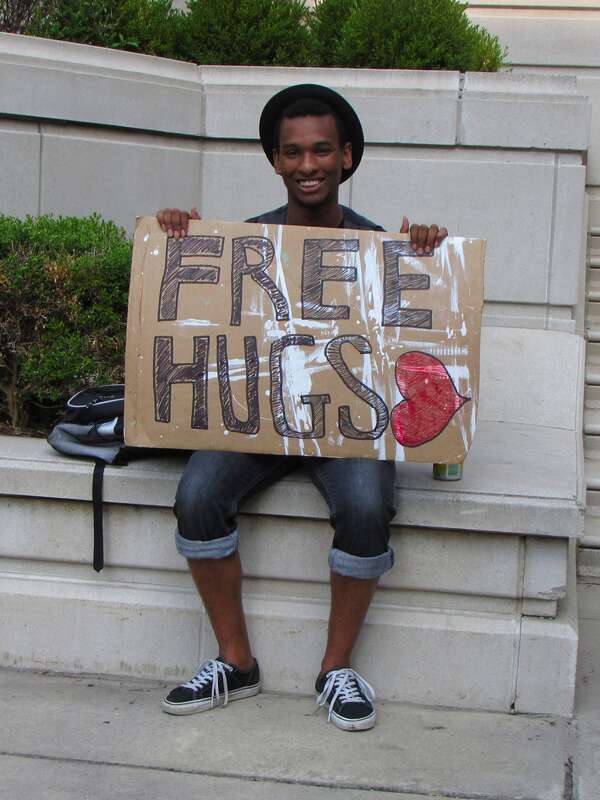 A man holds a &quot;FREE HUGS&quot; sign at Millennium Park in Chicago, Illinois.
More at The Schumin Web:
&amp;lt;a href=&quot;http://www.schuminweb.com/2011/08/11/and-fun-was-had-in-chicago-too/&quot; rel=&quot;noreferrer