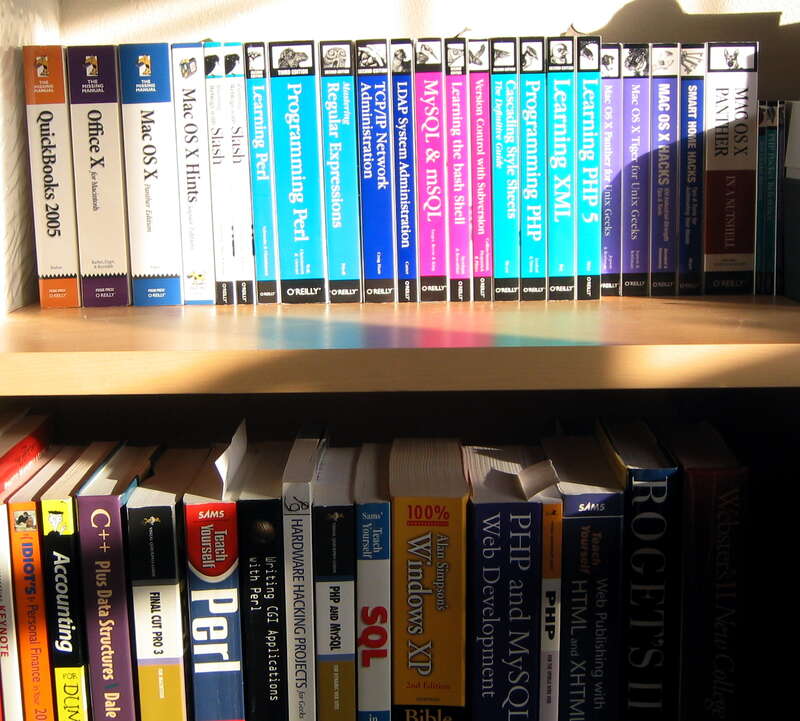 While unpacking and organizing my books today, I realised I might be a bit of a geek. Actually, looking at the picture again, I might be a lot of a geek. I have quite a library at work as well, so this isn't even all of the computer books I own.