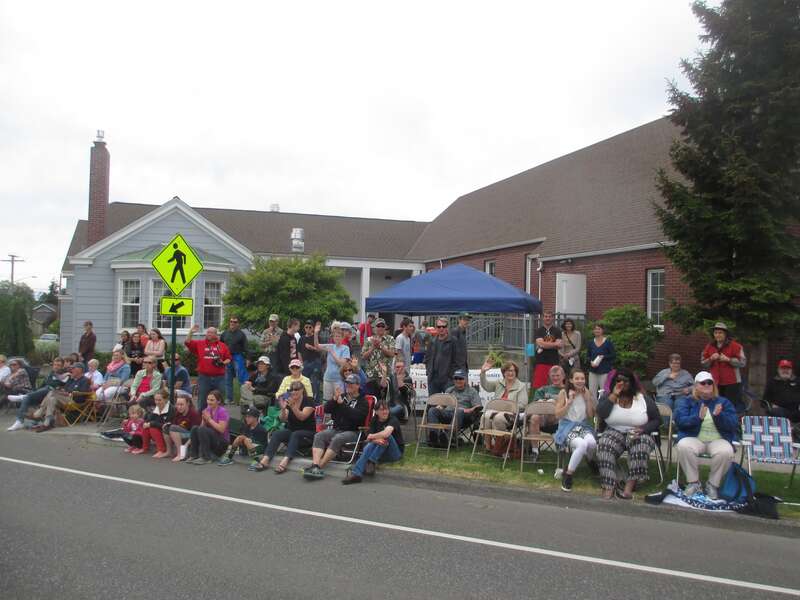 In front of Congregational Church, part of crowd watching along Cornwall Avenue