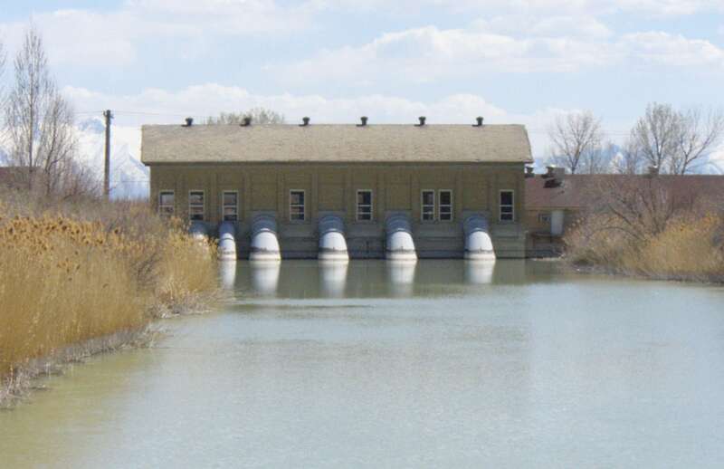 Pumping station that takes water from Utah Lake and puts it into the Jordan River.  Utah Lake is on other side of building with the Jordan River shown.