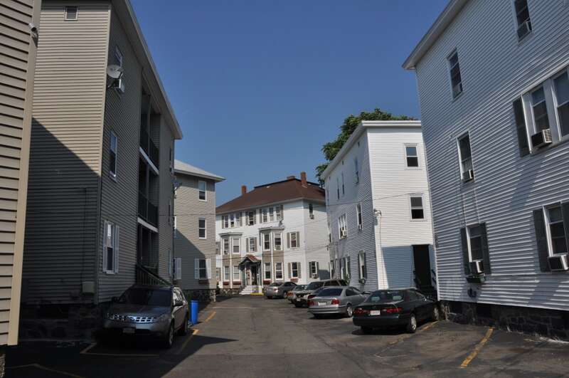The central area of the American Woolen Mills Housing District in Lawrence, Massachusetts.  One of the distinctive features of this district is the way the various buildings were laid out in an attempt to maximize housing density.
