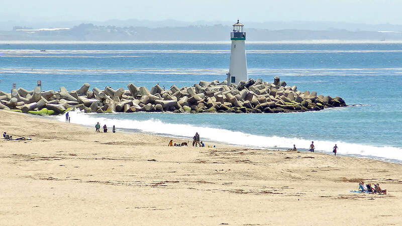 Located at the northern end of Monterey Bay, Santa Cruz Harbour is a haven for fishing craft and vessels. A harbor light, located at the west jetty, has marked its entrance for forty years. The original light was a box light structure which served