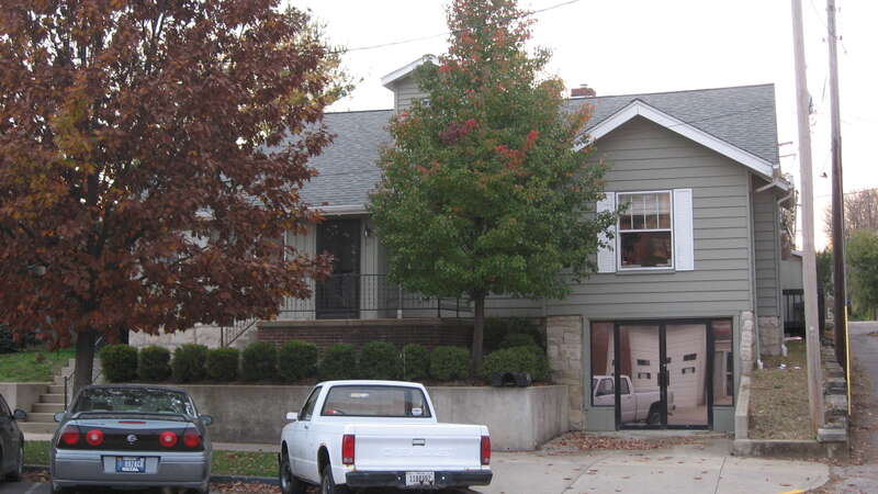 Front of the house located at 211 N. Madison Street in Bloomington, Indiana, United States.  Built in 1920, it is part of the Bloomington West Side Historic District, a historic district that is listed on the National Register of Historic Places.
