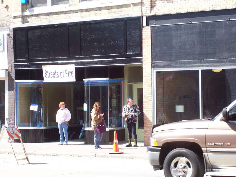 The punk dude with the blue and red hair looked real interesting, and he smelled funny.