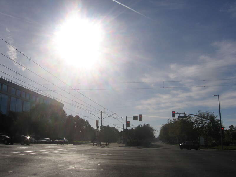 The Old Ironsides (VTA) light rail station along Tasman Drive in Santa Clara, California, USA.  View is looking west from the westbound lane of Tasman Drive.