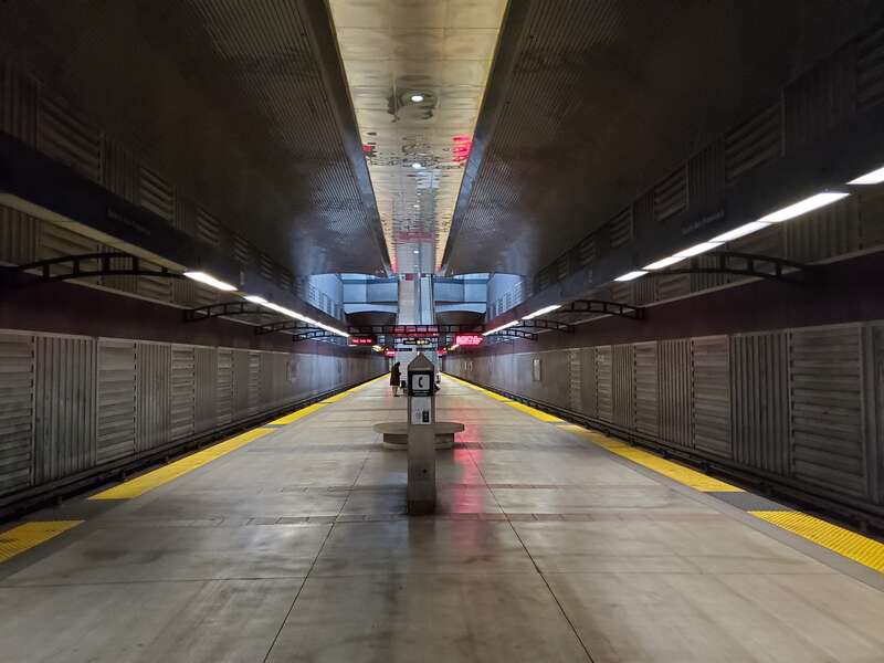 Facing north along the platform at South San Francisco station in December 2020