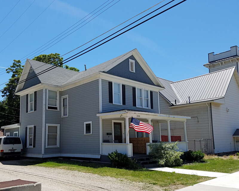 The parsonage was constructed for the adjacent Presbyterian church in the 1890s and is part of the North Caldwell Historic District.