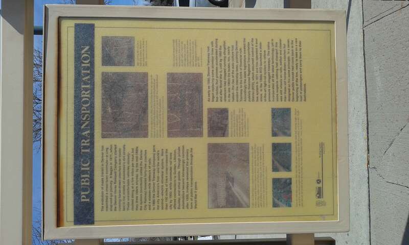 Public Transportation history board at Littleton - Downtown Station