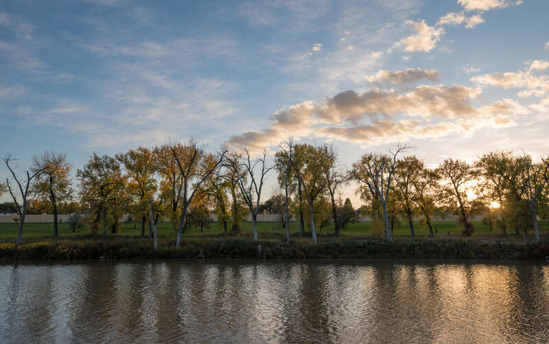 The banks of the Red River in Grand Forks, North Dakota, as seen from Red River State Recreation Area in East Grand Forks, Minnesota.