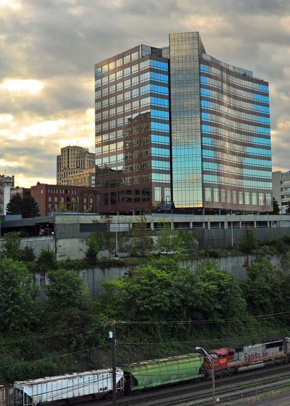 Russell Building above freight train, Tacoma, WA