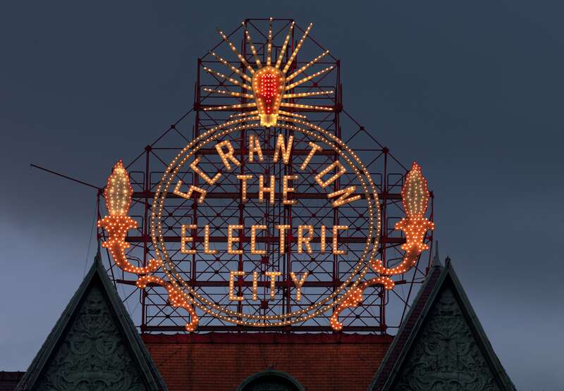 The sign &quot;Electric city&quot; in Scranton, Pennsylvania, photographed by Carol M. Highsmith, who has donated her collection to the Library of Congress and made it public domain.  See https://www.loc.gov/pictures/item/2010646302/