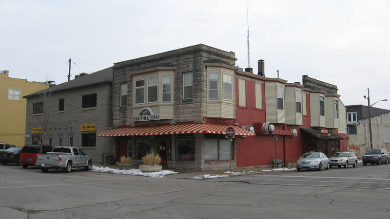 Front and western side of the Little Zagreb Restaurant, located at 223 W. Sixth Street in Bloomington, Indiana, United States.  Built in 1910, it is a part of the Bloomington West Side Historic District, a historic district that is listed on the