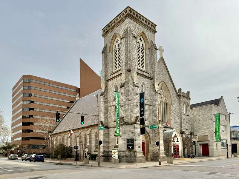 Built in 1863-1866, this Gothic Revival-style church was designed by C. C. Miller for the congregation of Trinity Episcopal Church, established in 1842.  The church saw the addition of a Gothic Revival-style parish house in 1875, which wraps around