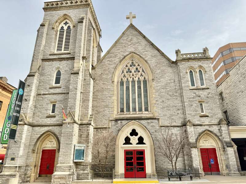 Built in 1863-1866, this Gothic Revival-style church was designed by C. C. Miller for the congregation of Trinity Episcopal Church, established in 1842.  The church saw the addition of a Gothic Revival-style parish house in 1875, which wraps around