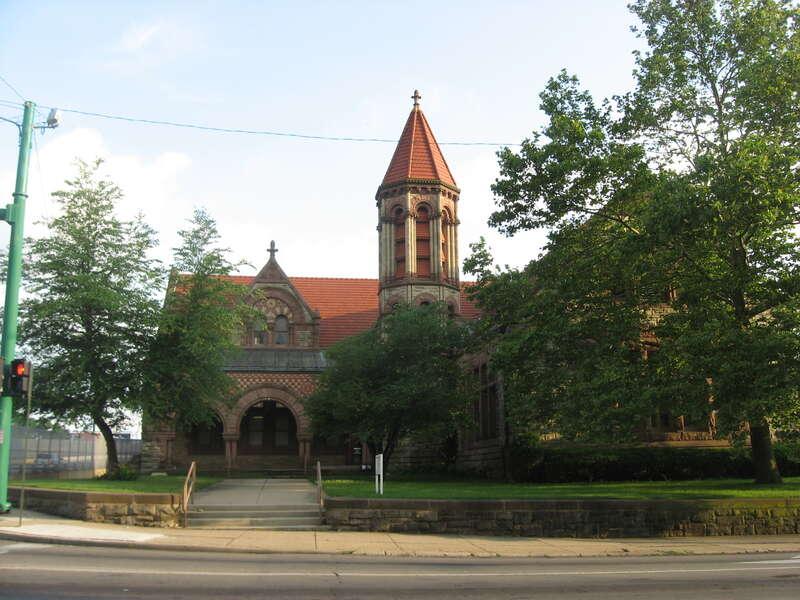 Front of the former Warder Public Library, located on the southwestern corner of the intersection of High Street and Spring Avenue on the eastern side of downtown Springfield, Ohio, United States.  Built in 1890 and since converted to a literary