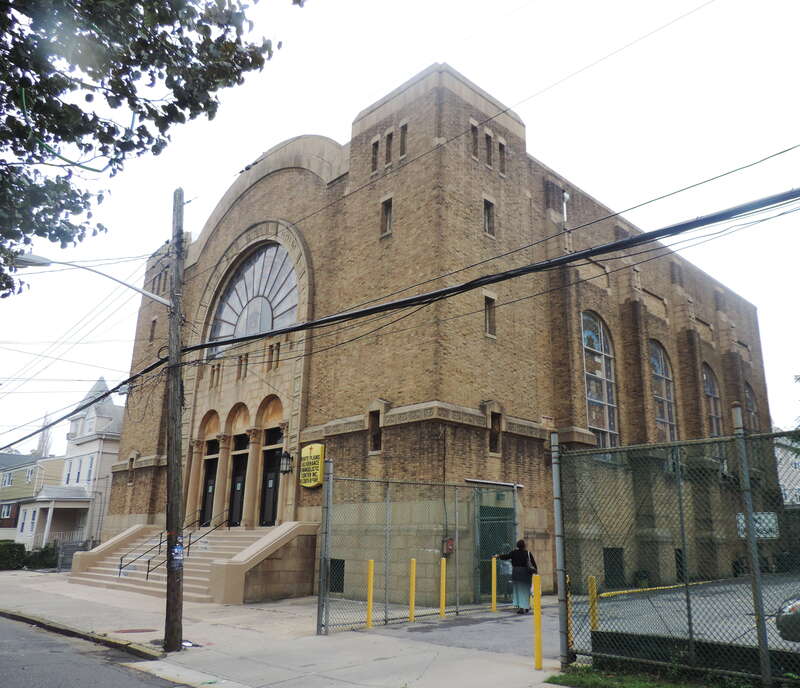 Looking south at church on a cloudy midday.