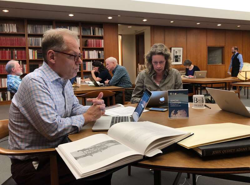 View of participants at the Amon Carter Museum of American Art's 7th edit-a-thon held in the museum's research library