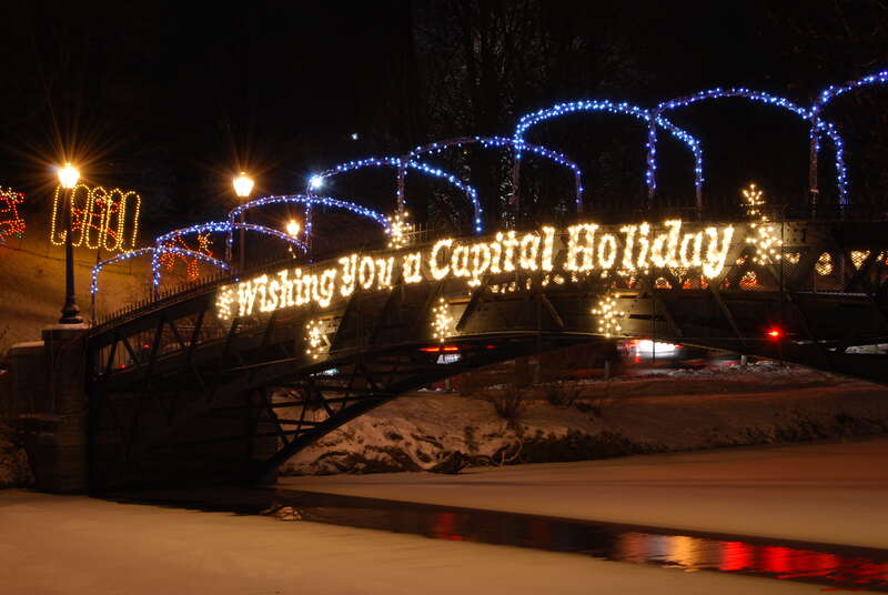 The footbridge over Washington Park Lake at Washington Park in Albany, New York, United States is decorated for the annual Capital Holiday Lights display