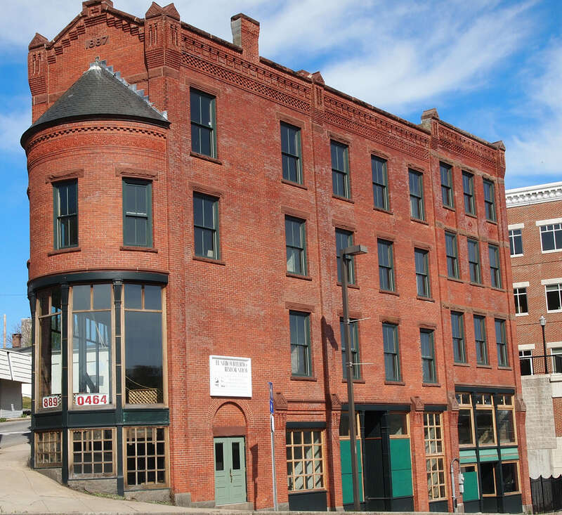 Connecticut - New London County - Norwich
National Register of Historic Places #82001007 NRIS
2011 May 01 From Chelsea Harbor Dr. view NE
edit: crop

White sign says &quot;Flatiron Building Restoration&quot;. Building is currently empty.