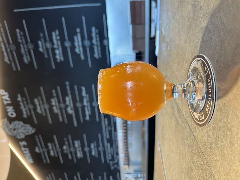 Grain &amp;amp; Blood blood orange DIPA at Crooked Goat Brewing in December 2023