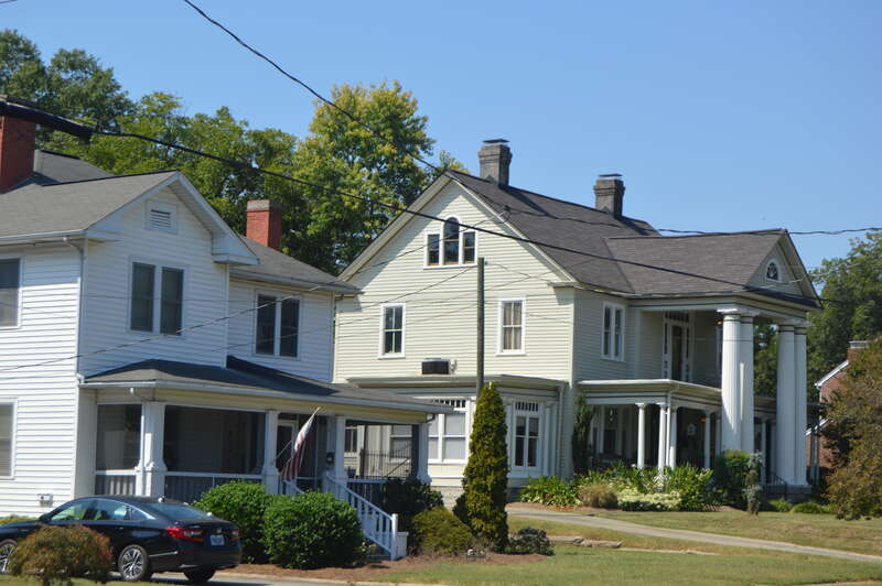 Houses on Davis Street between the Cameron and Tucker intersections in Burlington, North Carolina, United States.  This block is part of the East Davis Street Historic District, a historic district that is listed on the National Register of Historic