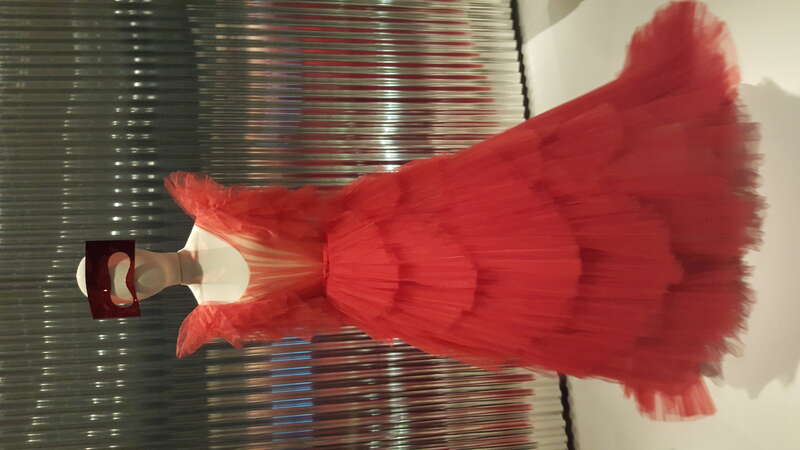 &quot;Dior Red&quot; tulle ball gown in tiered tulle fans by Maria Grazia Chiuri for Christian Dior (Spring-Summer 2018) on display at the Denver Art Museum