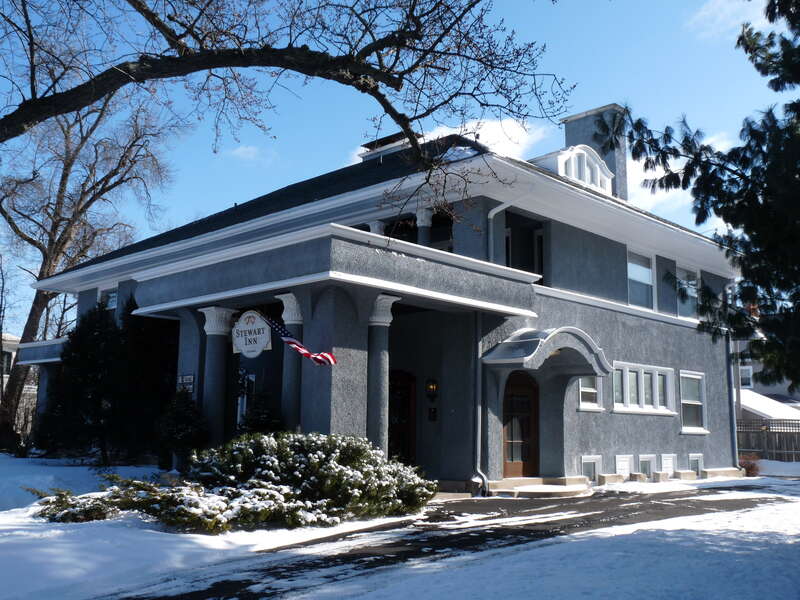 The Hiram C. and Irene Stewart House in Wausau Wisconsin is a Prairie School home designed by George Mayer and built in 1906.  Today it hosts guests as the Stewart Inn Bed and Breakfast.  The house is listed on the National Register of Historic