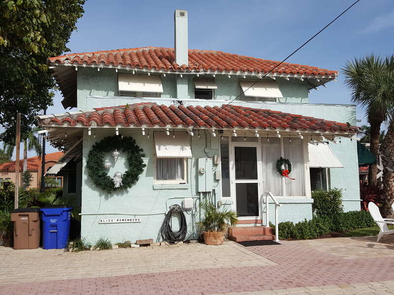 James D. and Alice Butler House S entry with Christmas wreaths and lights