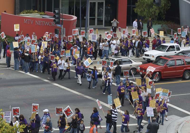 Janitorial workers are threatening to strike in Santa Monica. They started out at MTV and marched past RPA today.