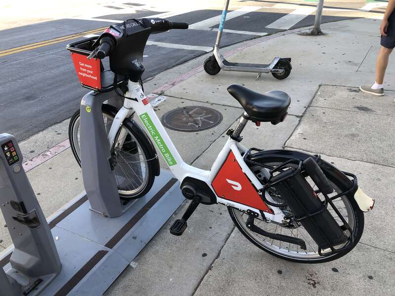 The non-drive side of an electric bicycle for rent at the Durango and Venice bike share station.