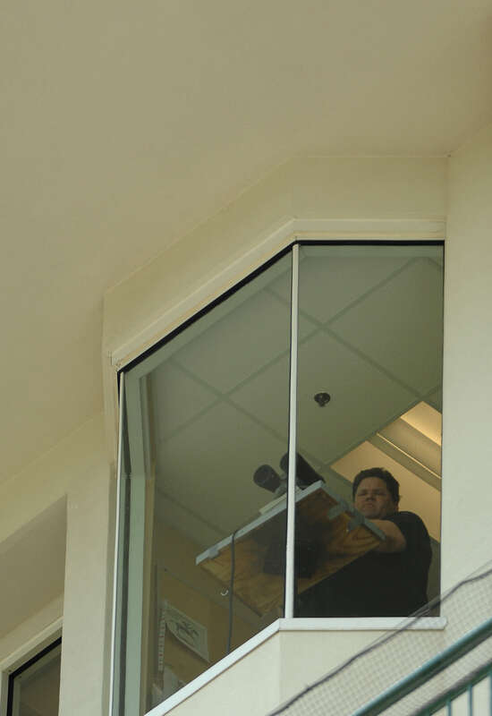 Churchill Downs announcer,Luke Kruytbosch, at work shortly before his death at age 47.