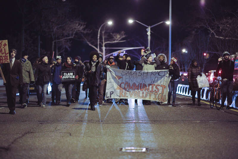 500px provided description: Tompkinsville, Staten Island, NY
December 19, 2014

Protestors march towards the Staten Island Supreme Courthouse after convening at the site of Eric Garner's death. [#march ,#protest ,#blm ,#black lives matter