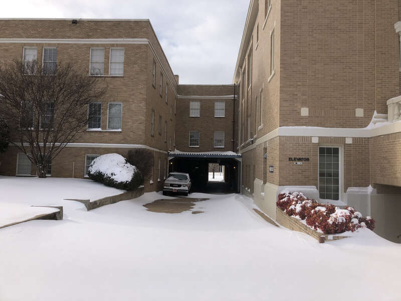 Photo of the First Baptist Church's access road in Muskogee OK during a respite in the w:en:February 13–17, 2021 North American winter storm. Photo taken from the Southeast.