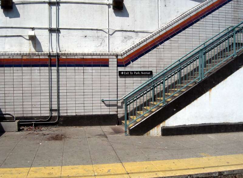 Looking west from northbound tram at southbound platform of Park_Avenue_(NCS_station)  on a sunny midday.  See also File:Park Av NLR low jeh.jpg