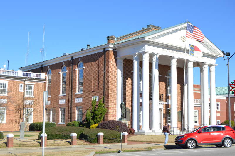 Front and western side of the Nash County Courthouse, located on Washington Street (North Carolina Highway 58) in central Nashville, North Carolina, United States.  Built in 1921, it is listed on the National Register of Historic Places.