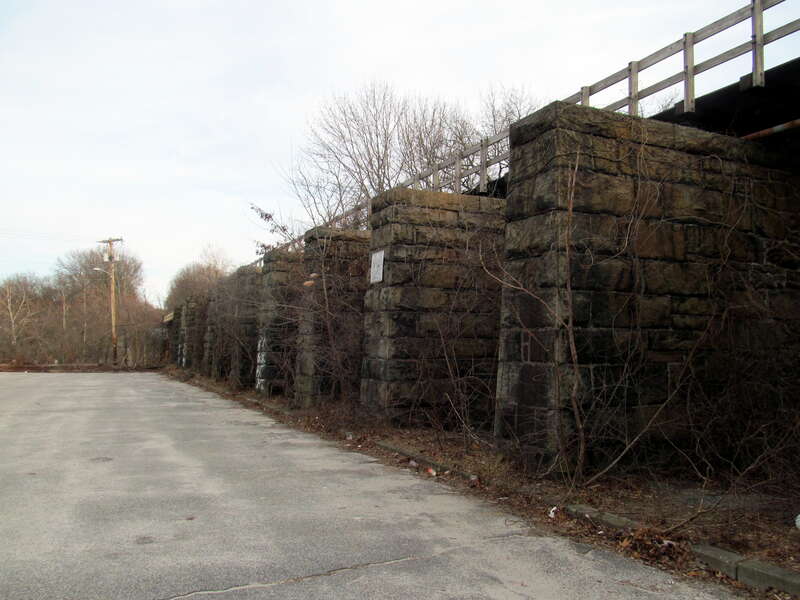 Providence &amp;amp; Worcester Railroad bridge in Woonsocket, Rhode Island in February 2016. The footings originally held two tracks, but now only one.