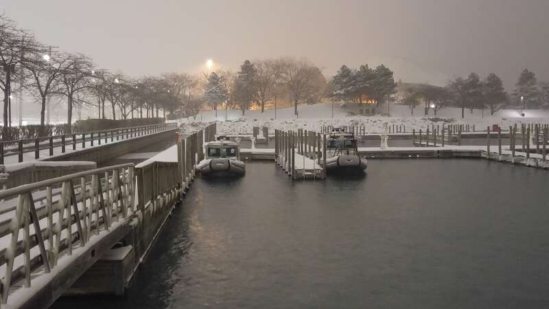 Patrol boats in their boat-wells at Milliken State Park (Tri-Centennial State Park). These were the last boats in the marina during a mid-December snow storm.