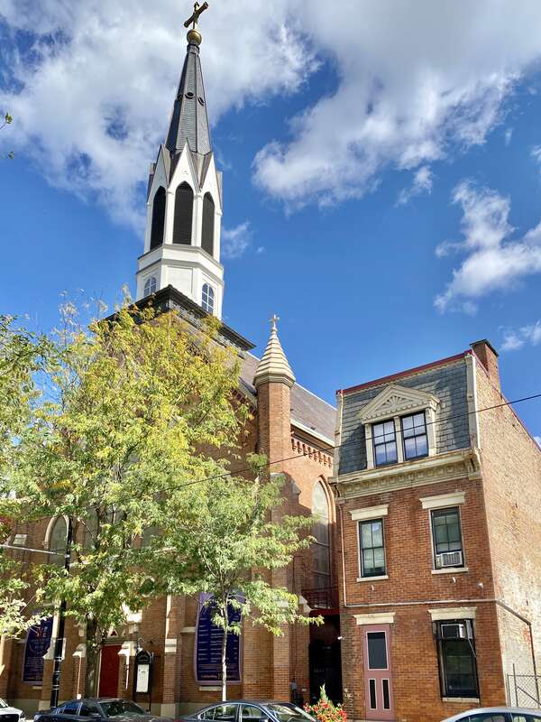 Built in 1871, this Gothic Revival-style church was built to house the congregation of what was then known as Trinity Lutheran Church, later known as Concordia Lutheran Church, and now known as Prince of Peace Lutheran Church, and stands on Race